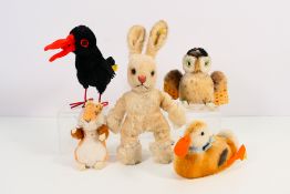 Steiff -A collection of vintage Steiff to include: 'Hucky' raven approx 17 cm tall,