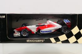 Minichamps - A boxed model in 1:18 scale