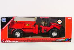 Britains 43181 NC Rear Discharge Manure Spreader with Case HI 600 Tractor in associated window box,