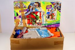 TMNT - A boxed Teenage Mutant Ninja Turtles city sewer lair playset,
