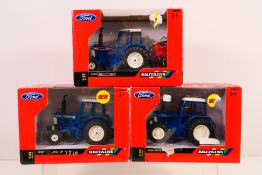 Britains - four 1:32 scale models comprising a Ford 7710 Tractor, Ford TW15 Tractor,