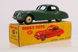 Dinky - A boxed Jaguar XK120 Coupe in dark green # 157.