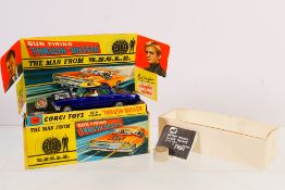 Corgi - A boxed Man From Uncle Thrushbuster Oldsmobile # 497.
