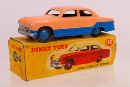 Dinky - A boxed Ford Fordor Sedan in low line two tone pink over blue # 170.