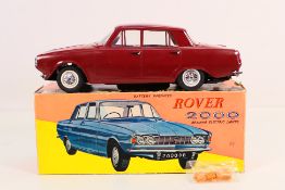 OK Toys - A boxed vintage battery operated Rover 2000 P6 with electric lights # 3315.