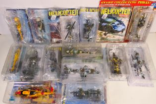 Amer - A collection of 14 boxed diecast