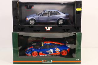 UT Models - A pair of boxed 1/18 scale d