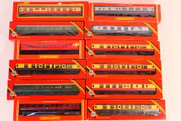 Hornby - A boxed rake of 12 OO gauge pre
