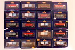 Bachmann - 20 boxed OO guage wagons and other freight rolling stock, all appear mint in box,