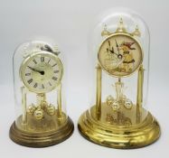 Two Glass Domed Quartz Mantle Clocks. As found. Winning bidder must pick up from Cadmore HQ.