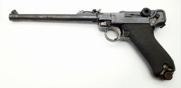 A Deactivated German 9mm Luger. DWM 1915 make with 9 x 19mm Parabellum calibre. 8 inch barrel.