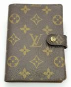 A Louis Vuitton Brown Monogram Canvas Small Agenda Cover. Brown monogram coated canvas exterior with