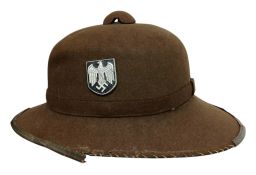 WW2 German Africa Corps 2nd Pattern Tropical Helmet with sand goggles. Nice clean example missing