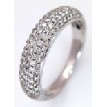 An 18K White Gold Diamond Pave Ring. Size J 1/2. 3.53g. Two small diamonds missing.