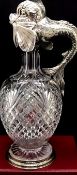 A SILVER-MOUNTED CUT-GLASS DECANTER CIRCA 1890, POSSIBLY FABERGE- FRENCH TAX HALLMARK Of spherical