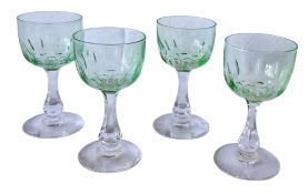 A set of four vintage, 1920's Val Saint Lambert aperitife glasses. With clear carved stems and