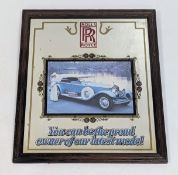 A Vintage Rolls Royce Advertising Mirror. In frame - 48 x 58cm. Winning bidder is advised to pick up