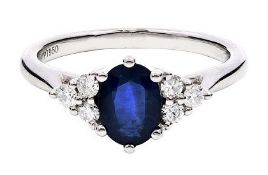 A Platinum natural Blue Sapphire and Diamond Ring. Blue sapphire - 0.98ct. Diamond - 0.26ct. Size M.
