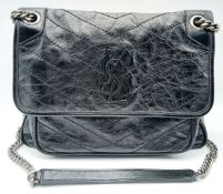 A Black Saint Laurent Crinkled Leather Niki Shoulder Bag. Black crinkled leather exterior with