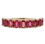 A 9K Yellow Gold Ruby Ring. Nine Oval Cut Rubies, Weighing Total 2.14ct. Total Ring Weight 2.58g,