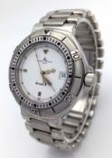 A Baume and Mercier Formula S Quartz Watch. Stainless steel bracelet and case - 36mm. White dial