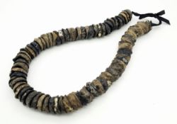 A Vintage Half-Cut Kukui Nut Necklace. 70cm of nut.