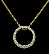 An 18K Yellow Gold Diamond Open Circular Pendant on an 18K Yellow gold Chain/Necklace with a 9K gold