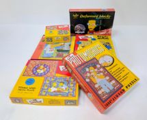 Five Simpsons jigsaw puzzles and a Bart Simpson block building set. All complete and in original