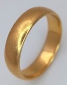 A 22K Yellow Gold Band Ring. 6mm width. Size O. 5.9g.