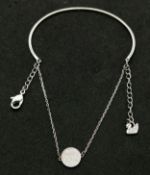 A Swarovski Silver-Tone Bangle with Crystal Set Charm Detail. Approx 6cm diameter. Please see photos