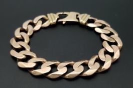 A Chunky 9K Yellow Gold Cuban Link Statement Bracelet. A serious piece - in good condition. 22cm.