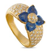 A Van Cleef & Arpels 18K Yellow Gold 0.50ct Diamond and Sapphire Flower Ring. A fabulous floral
