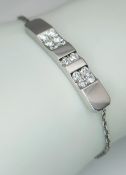 A DE BEERS, 18K WHITE GOLD, DIAMOND SET BRACELET. 0.60CT WEIGHT. TOTAL WEIGHT 8.8G. A/S RED 1007