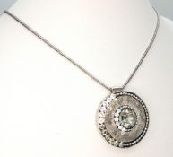 A Magnolia 925 Silver Circular Stone Set Pendant Necklace. Both necklace and pendant are