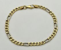 An 18K Yellow and White Gold Fancy Figaro Link Bracelet. 18cm. 5.25g, clasp as found, see photo.