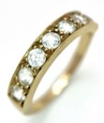 A 14K Yellow Gold (tests as) White Stone Half Eternity Ring. Size L 1/2. 2.7g total weight.