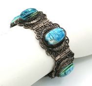 A Vintage White Metal Filigree Scarab Bracelet-18cm Length. 2.6cm Width.