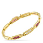 An 18K Yellow Gold 1.0ct Diamond and Ruby Bracelet. Channel-set Diamonds with a total weight of 1.
