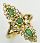 AN 18K YELLOW GOLD, DIAMOND AND EMERALD SET, MARQUISE SHAPED, COCKTAIL RING. 4.7G, SIZE Q. TAN 2002
