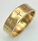 A 9K Yellow Gold Band Ring with Geometric Pattern. 5mm width. Size L 1/2. 2.75g.