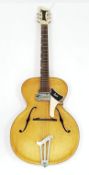 A vintage, 1950's/60's, East German, Martin Graubner, 16" ach top Lux guitar. Nice condition. The