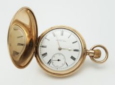 An Antique 14K Gold Plated Doubled Cased Full Hunter A.W.W. Waltham Pocket Watch. Top winder. 54mm