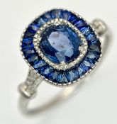 A Captivating 950 Platinum Sapphire and Diamond Ring. 0.94ctw Sri Lankan sapphires with 0.04ctw