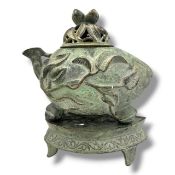An antique Verdigris Bronze Fruit and Leaf Decorated Teapot on Stand. Heavy signs of age-related