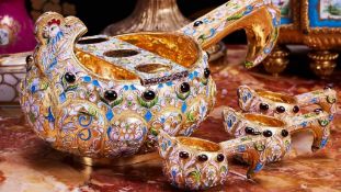 A FINE SILVER GILT AND CLOISONNE ENAMEL RUSSIAN STYLE BIRD KOVSH SETin the style of Faberge, the