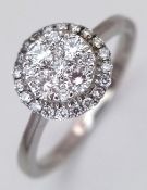 AN 18K WHITE GOLD, DIAMOND SET RING. 0.35CTW. 3G, SIZE N. TAN 2008
