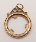 A 9K YELLOW GOLD, HALF SOVEREIGN SIZE, PENDANT MOUNT. 2.1G. SC 2016