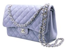A Chanel Classic Jumbo Quilted Double Flap Bag. Muted lilac diamond-quilted lambskin leather