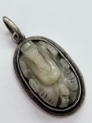SILVER and CARVED JADE GANESH PENDANT. 3.5 cm drop.