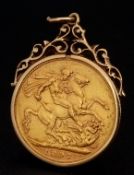 An 1897 Queen Victoria 22K Gold Full Sovereign Coin in a 9K Gold Pendant Setting. 3.5cm. 9.75g total